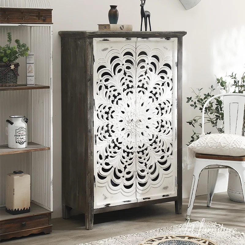 

Old carved three-story double-door cabinet made of solid wood