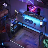 48 Inch L Shaped Gaming Desk with LED Lights Power Outlets Monitor Stand Reversible Shelves Adjustable Height Durable Carbon 2