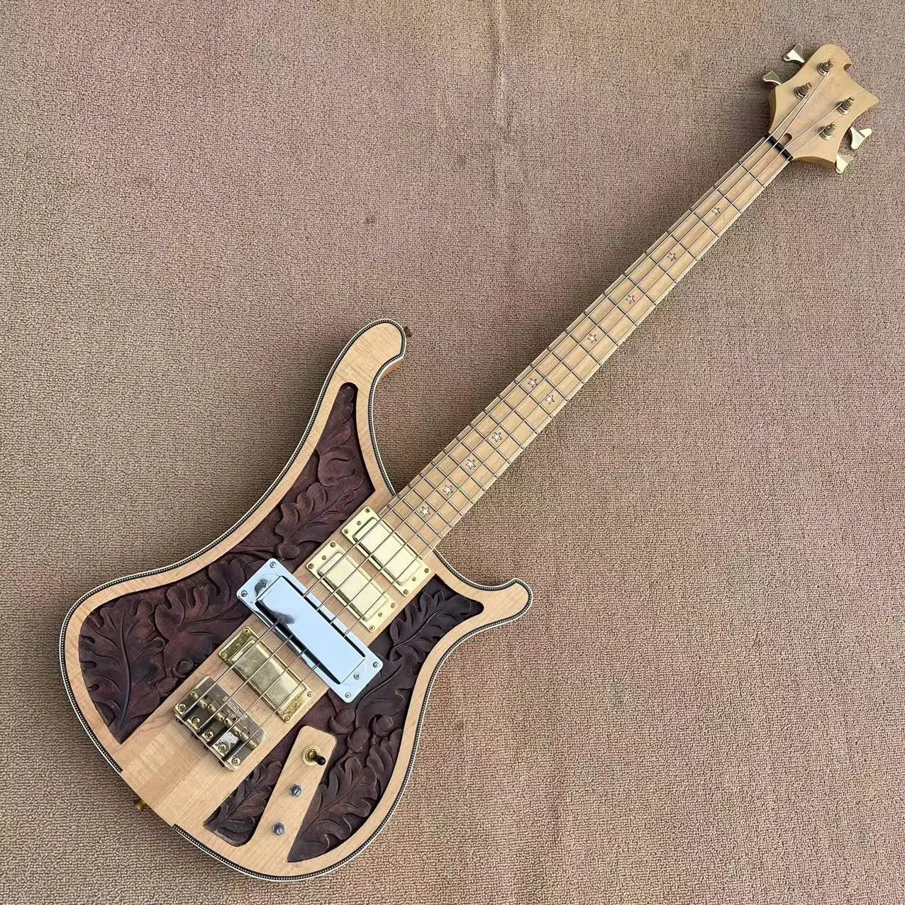 

Rickenbach 4-string electric bass, maple carved piano body, five star inlay of maple fingerboard, four pickups, standard chord p