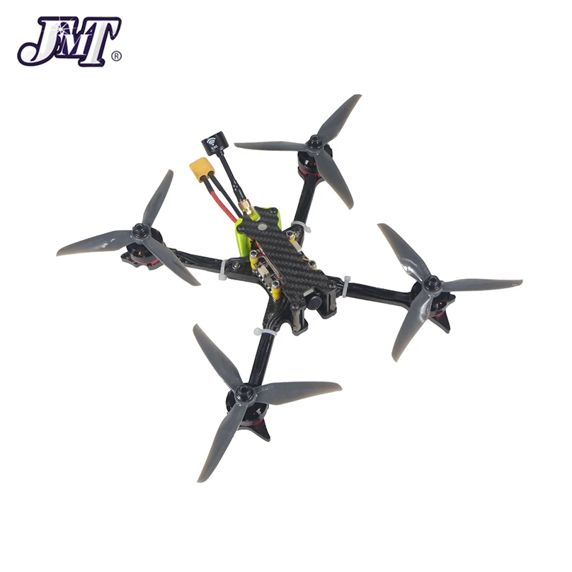 Drone FPV B-FPV RTF FS-i6 Set posé, hélices et batterie visibles, prêt à l'emploi.