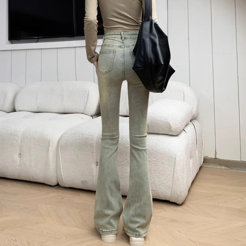American retro yellow mud dye micro-ram jeans female spring new high-waisted elastic Slim versatile flare pants tide