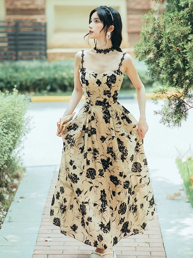 

Summer new women's Bohemian travel beach print halter dress elegant slim travel retro backless dress