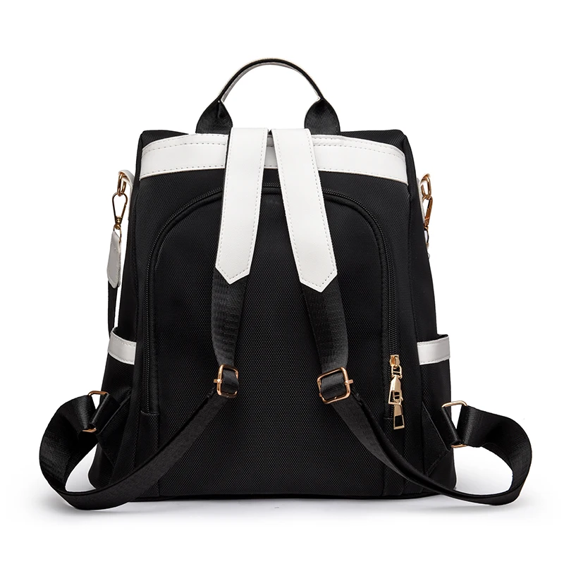 Women's travel backpack, large capacity, zipper closure, convertible shoulder bag design, perfect for school, work or travel