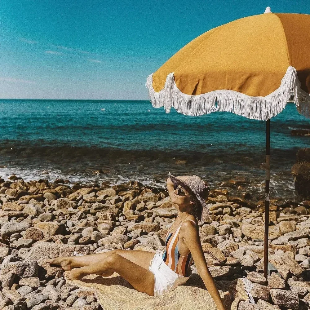 

Holiday Beach Umbrella White Fringe Boho Beach Umbrella, UPF 50+, Premium Wood Pole, 5’W x 6.5’H, Vintage Gold, Patio Umbrellas