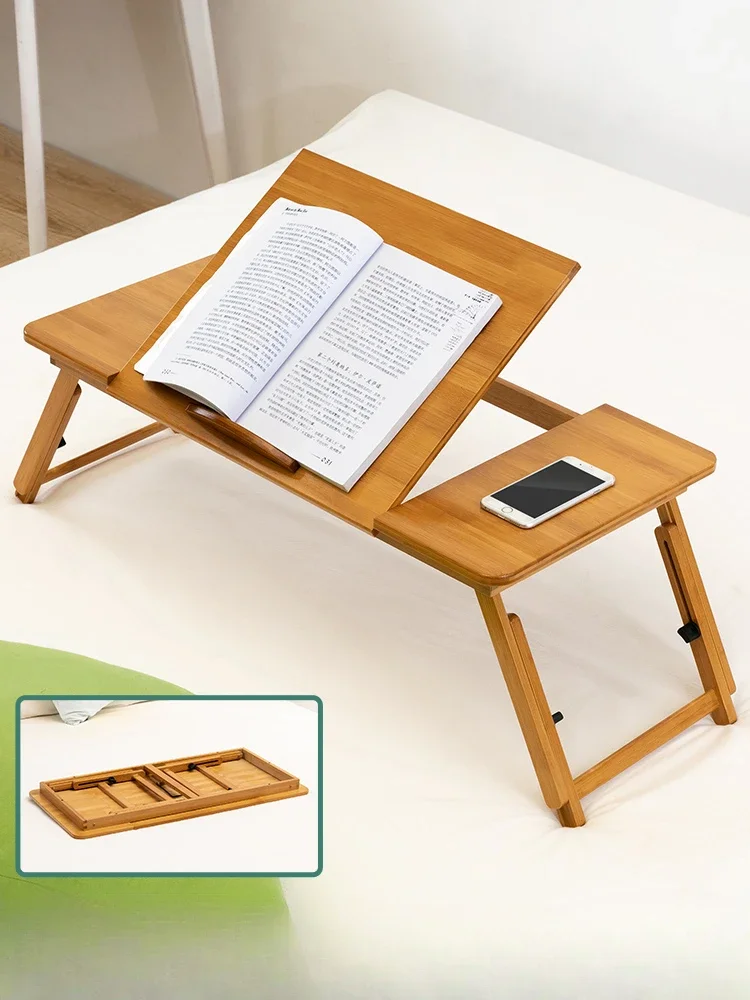 

Trojan horse folding bed, small book desk, laptop, lazy dormitory, students' home bedroom, simple writing.