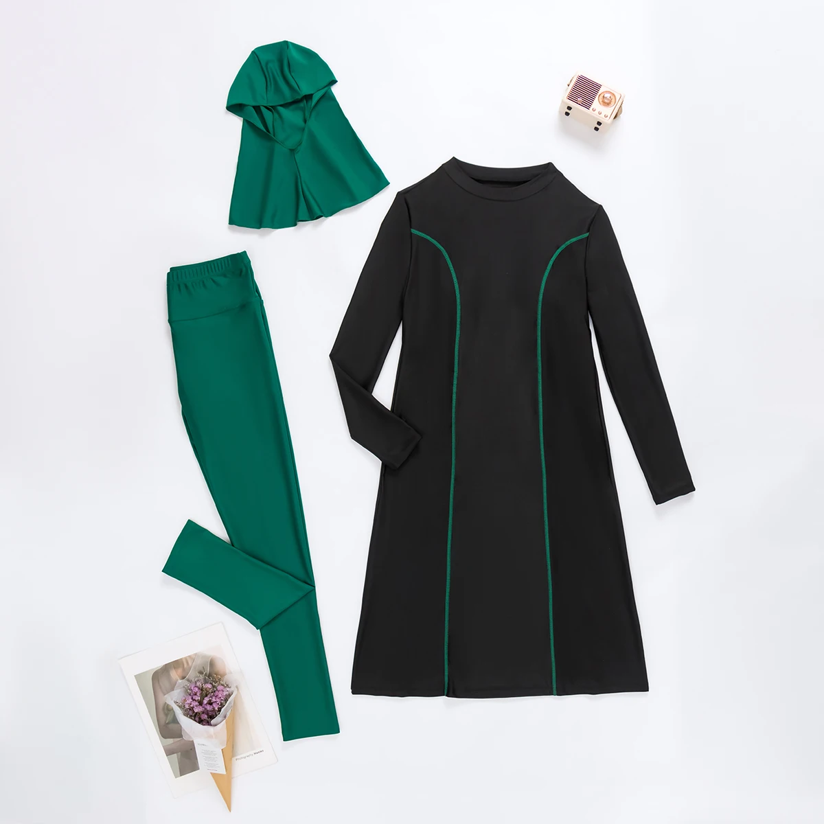 Back view of modest swimsuit with attached hijab and leggings