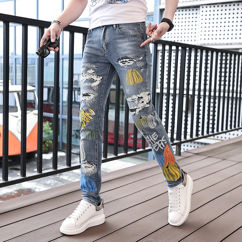 Summer thin section of light luxury street personality fashion printing hole jeans men's casual Slim long tight men's pants