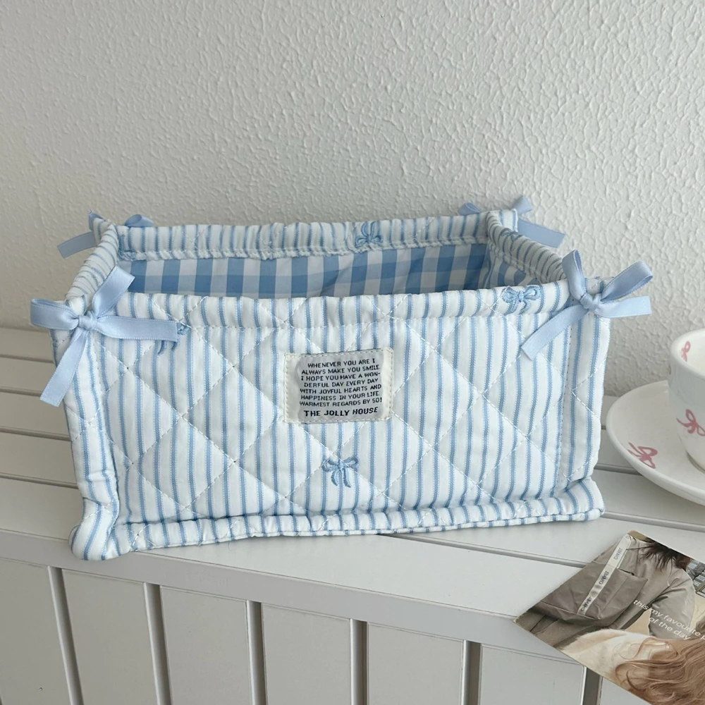 HavenNest™ Quilted Storage Basket S3d9c5391a25547f49a348a6a8416a696A
