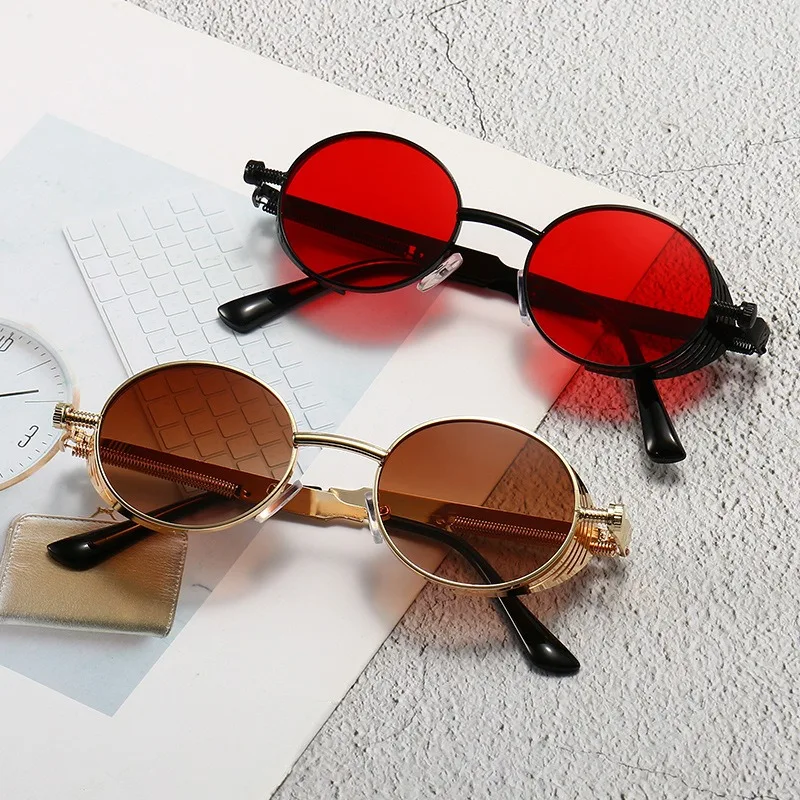 

New steam punk sunglasses from Europe and America wind resistant hollow flip metal sunglasses retro street photo sunglasses 1970