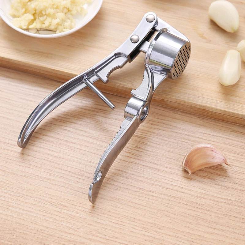https://ae01.alicdn.com/kf/S3db5964362d64ba48319201334cea6e7S/Garlic-Press-Garlic-Paste-Multifunctional-Clip-Stainless-Steel-Manual-Pull-Garlic-Beater-Kitchen-Accessories-Garlic-Chopper.jpg