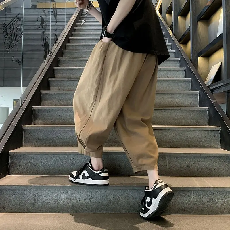Summer New Solid Color Fashion Elastic Waist Ankle Length Pants Man High Street Pockets Patchwork Cotton Personality Haren Pants