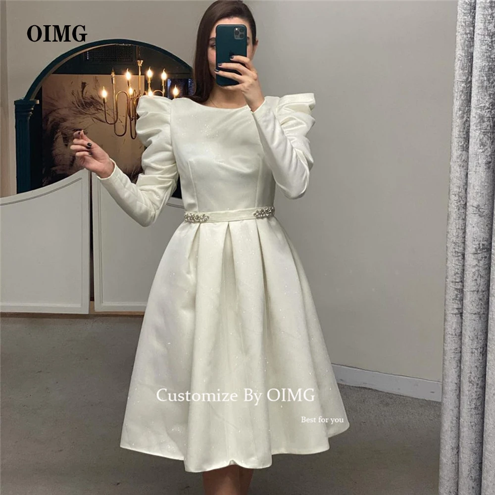 

OIMG Modest Shiny Satin Short Evening Party Dresses Puff Long Sleeves Knee length Sparkly Crystal Sash Bride Party Dress Formal