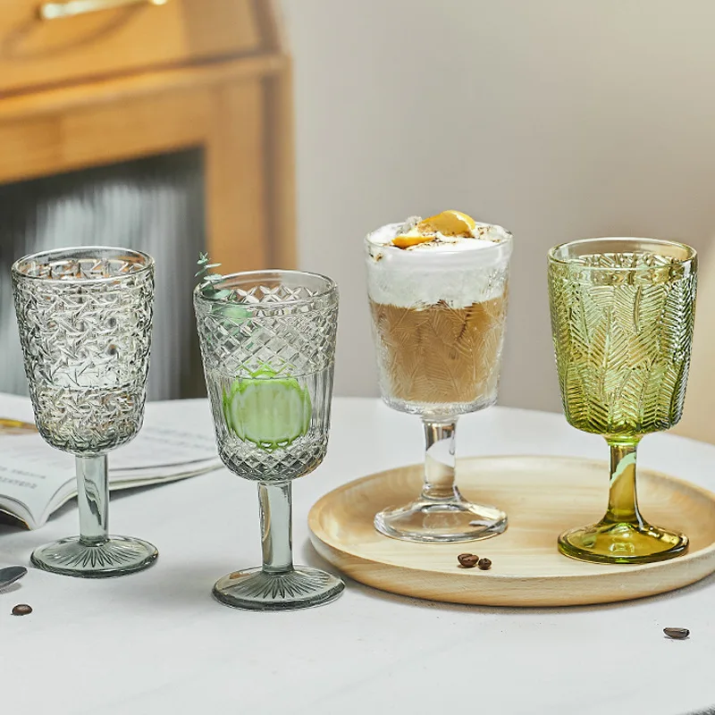 https://ae01.alicdn.com/kf/S3dd59bfe55db45cf865edf5ae44dca5di/1-Piece-Vintage-Embossed-Clear-Colored-Goblet-Green-Grey-Red-White-Wine-Glasses-Goblets-Stemware-Glass.jpg