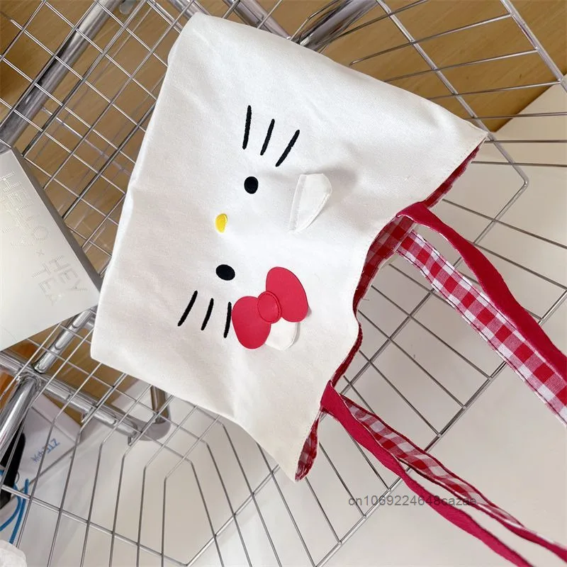 Sanrio 헬로 키티 패션 토트 백 여성의 새로운 트렌드 대용량 핸드백 하라주쿠 단순 캐주얼 통근 캔버스 숄더 백