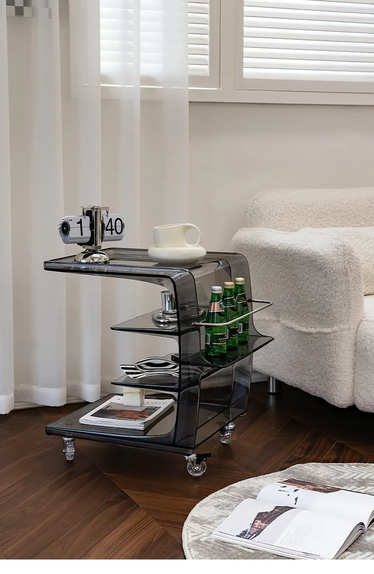 

A few movable acrylic trolleys beside the sofa, small coffee table, bedside cabinet in online celebrity ins wind.