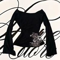 Mode européenne et américaine nouveau imprimé fleuri col rond à manches longues petit haut ajusté noir T-Shirt à fines rayures 4