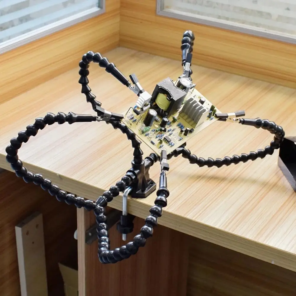 Table de soudage fixe avec bras flexible pour modélisme, 30cm, utilisée avec un fer à souder et un rouleau de soudure.