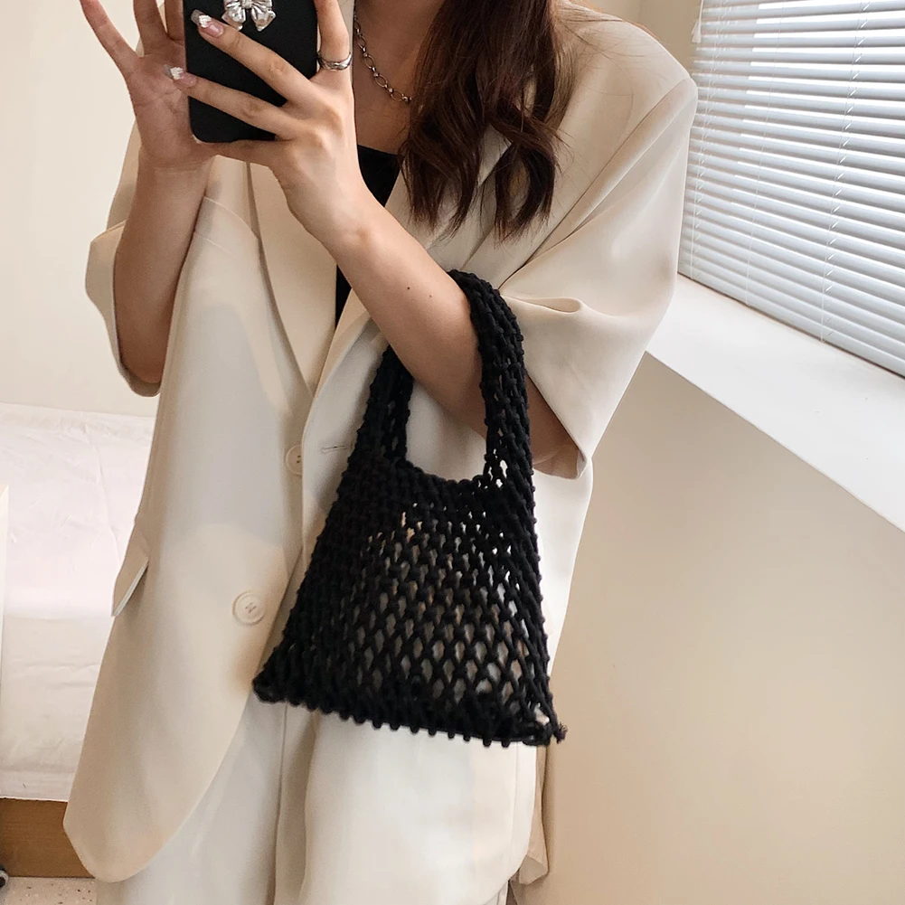 Nuova borsa da spiaggia all'uncinetto per ragazze Corda di paglia estiva Scava fuori Borsa da donna intrecciata a mano Borsa da donna a maglia vuota_voghion.com