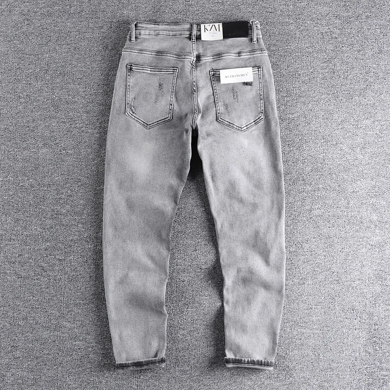 

new 2023 spring and summer menswear cigarette heavy industry washing cat beard hole jeans elastic slim fit Leggings