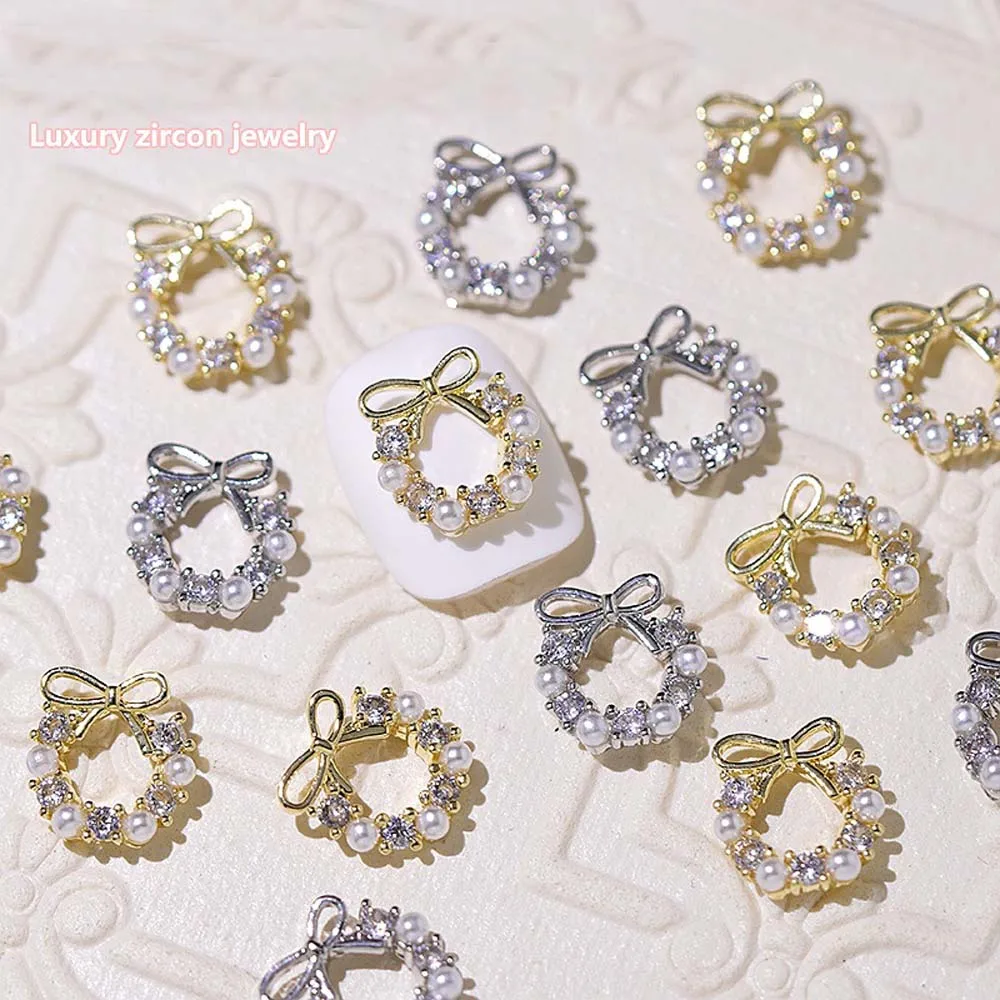 10Pcs 크리스마스 럭셔리 합금 갈 랜드 Bowknot 네일 아트 장식 10*11mm 3D 지르콘 진주 네일 매력 DIY 바로크 갈 랜드 네일 부품
