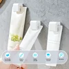 1-20PCS Toothpaste Holder Wall-mounted Face Wash Hanging Clip Self-Adhesive Toothpaste Clip Storage Rack Bathroom Accessories 4