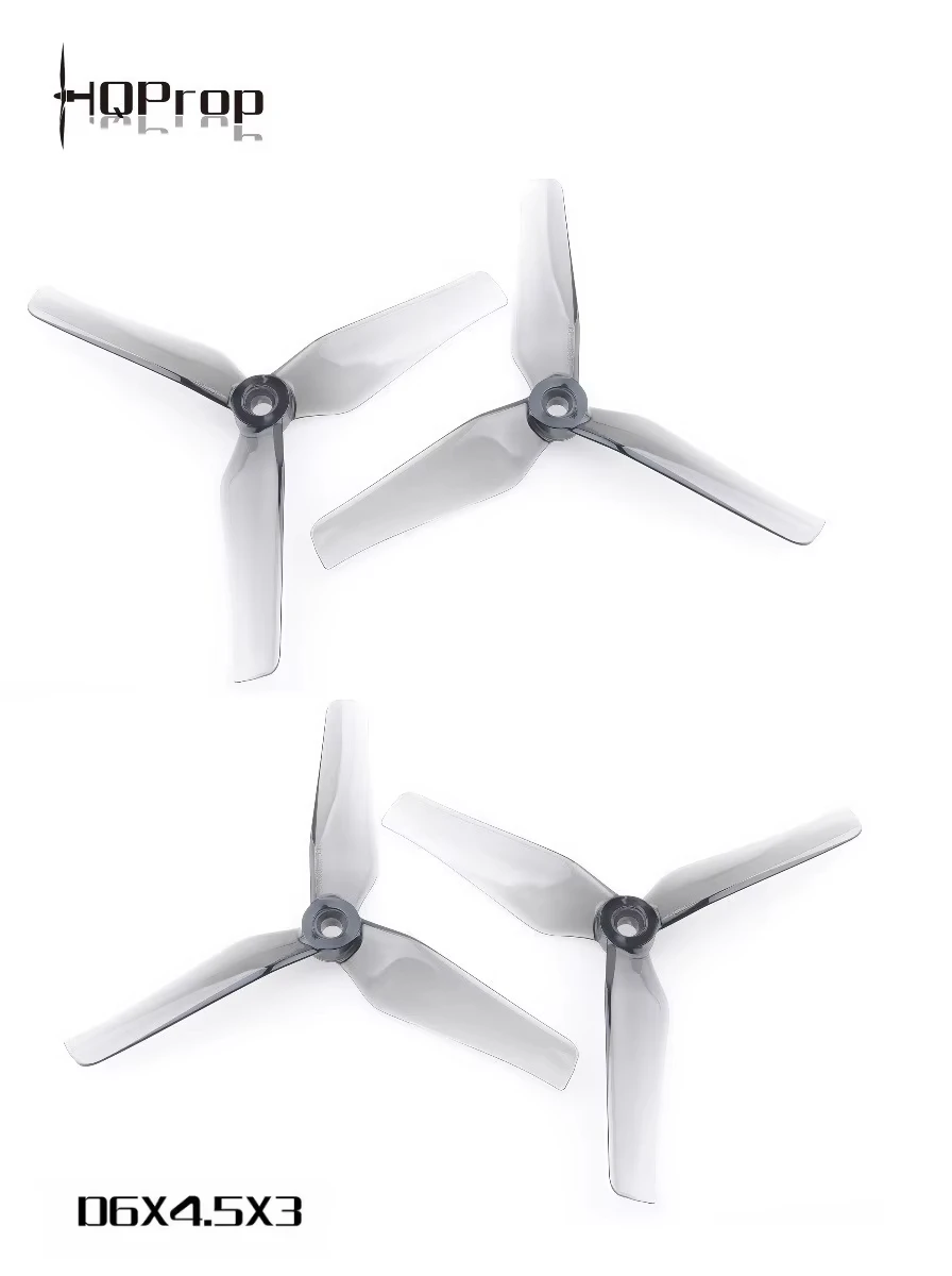 Paire d'hélices D6X4.5X3 pour drone, couleur grise, posées sur fond blanc