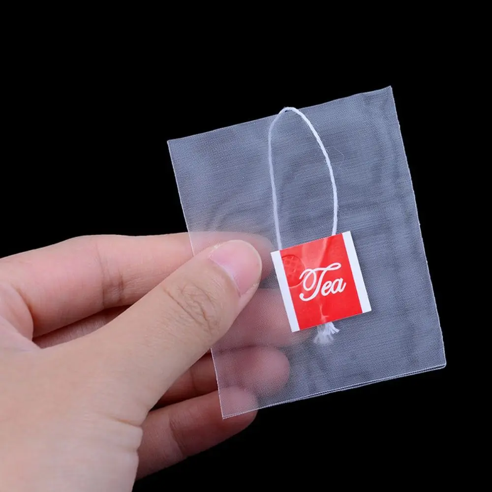 100Pcs Durable Transparent Disposable Transparent Teabags with String Heat-sealable Empty Tea Bags Nylon Filter Paper Teabags