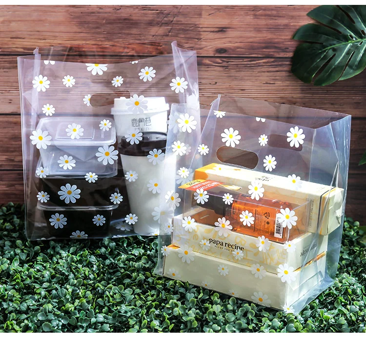 Description Picture 4 of item25-50pcs Little Daisy Plastic Gift Bag Clear Storage Shopping Bag With Christmas Wedding Party Favor Bag Candy Cake Wrapping Bag