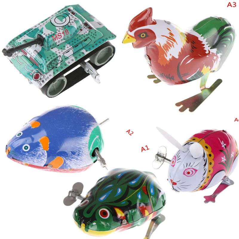 Nouveaux enfants classique étain liquidation horloge jouets sautant fer grenouille lapin coq jouet figurines d'action jouet pour enfants enfants classique jouet