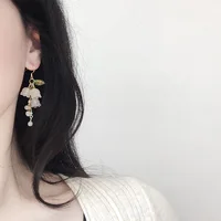 2025 New Sweet Temperament Small Fresh Bamboo White Lily Of The Valley Flower Earrings Elegant And Gentle Asymmetric  Earrings 2