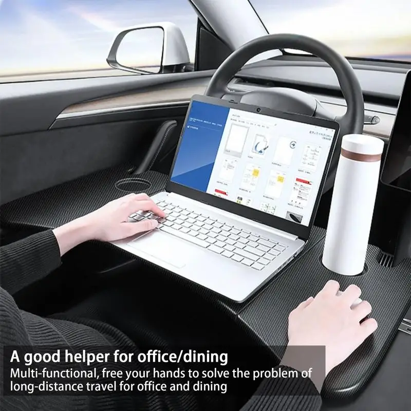 https://ae01.alicdn.com/kf/S3ea00e5637f44aefa074ca3dc57a286bt/Table-For-Tesla-Model-3-Model-Y-Steering-Wheel-Board-Laptop-Notebook-Foldable-Desk-Mount-Eating.jpg