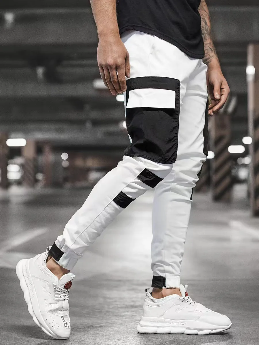Autumn and winter new foreign trade men's casual sweatpants woven pocket spliced corset slacks