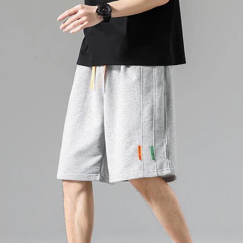 2023 Summer New Solid Color Casual Loose Knee Length Shorts Man Elastic Waist Drawstring Pocket Fashion Motion Out Streetwear