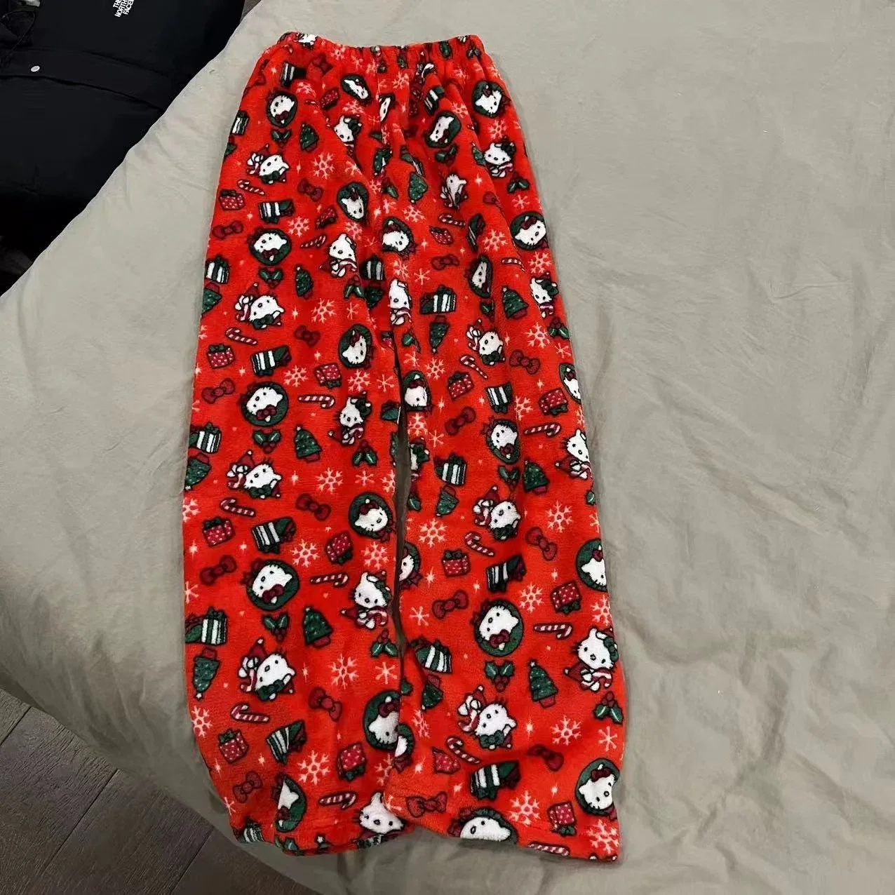 Christmas Hello Kitty pajama pants, loose anime-style loungewear trousers for women, cute cartoon couple sleepwear from CyberStreetOne.com red