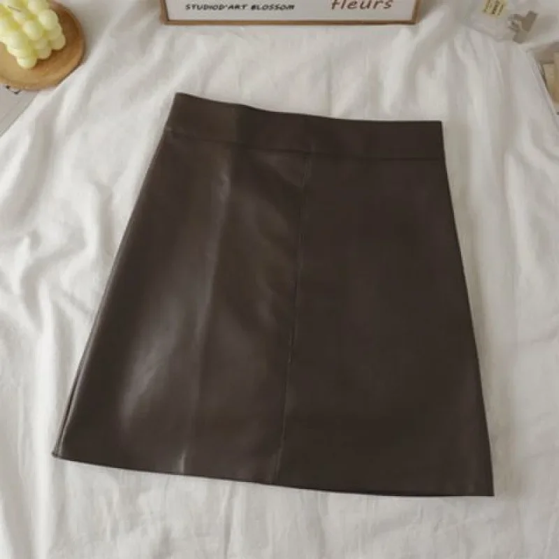 thumbnail image 1 of Minivestido ajustado de talle alto y talla grande para mujer, falda negra de corte A con cobertura de cadera, nuevo estilo de otoño, 1 of 5