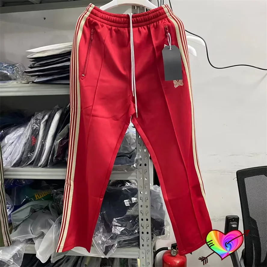 

2023 Red Needles Track Pants Men Women Narrow Needles Pants Embroidery Butterfly Logo Sporty Sweatpants High Street AWGE Trouser