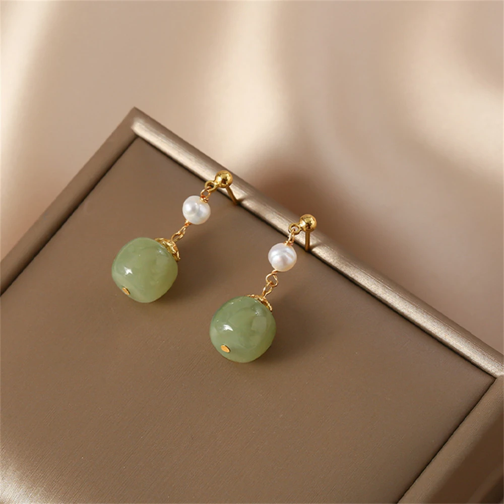 Napier faux jade earrings carved glass Mandarin Fantasies floral design  clip on. Description: Vintage clip on sty… | Jade earrings, Fake earrings,  Vintage jewelry