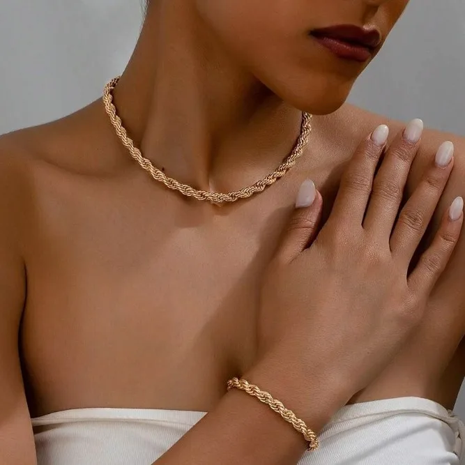 Joyierre Mujer الذهبي الفولاذ المقاوم للصدأ ثعبان العظام سلسلة قلادة الهيب هوب شيك المرأة أسلوب بسيط قلادة سوار مجموعات مجوهرات بالليزر 5