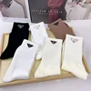 Classic Pure Color Black White P Letter Triangle Label Fashionable Unisex Mid-Calf Hand-Sewn Combed Cotton Socks