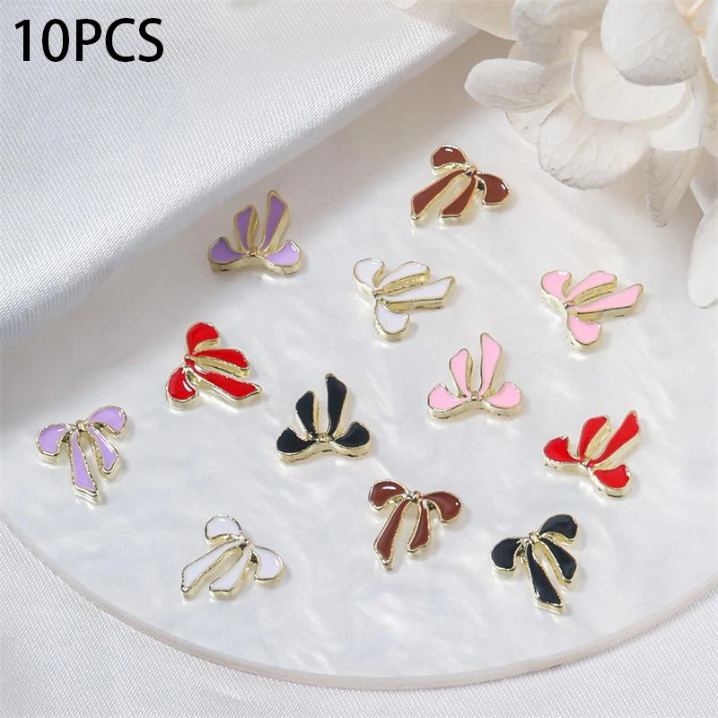 

10PCS/Bag New Alloy Colorful Oil Drop Bow Nail Art Accessories Fashion Simple Nail Charms Sweet Bowknot DIY Nail Art Accessories