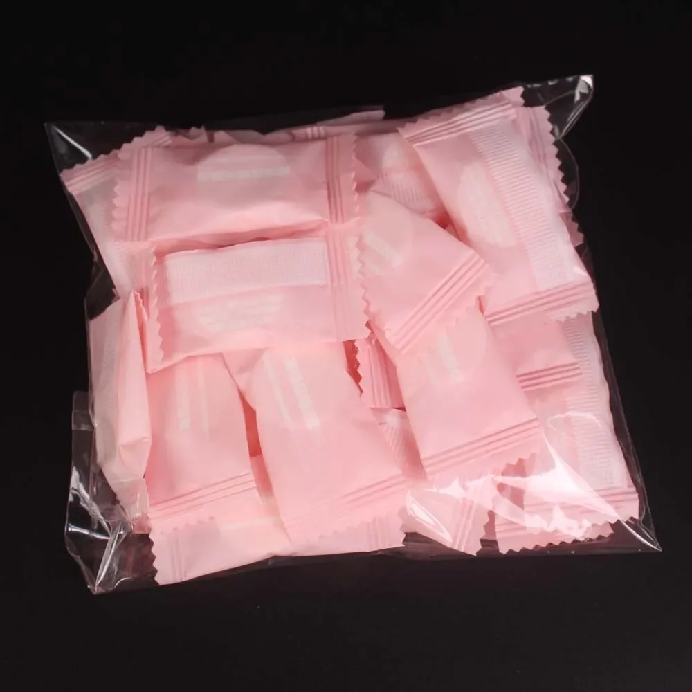 100PCS Mini Compressed Towel Disposable Capsules Towel Magic Face Care Tablet Outdoor Travel Cloth Wipes Paper Tissue compressed towels