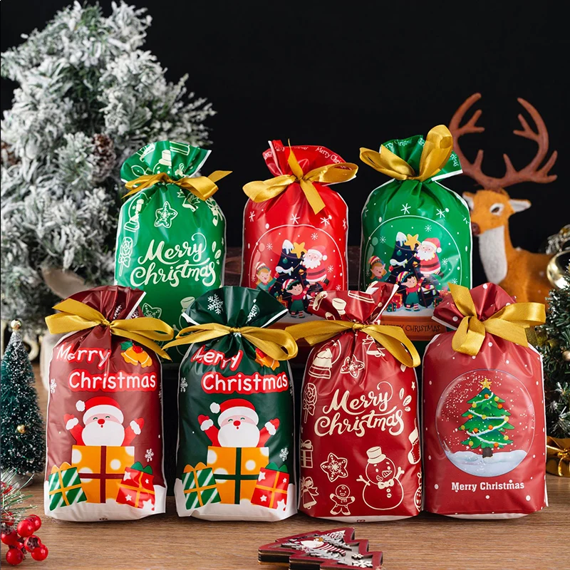 

Hot Sale 25Pcs/Lot 15x23cm Christmas Plastic Gift Bag Party Favor Boutique Cosmetics Gifts Candy Packaging Bags With Drawstrings