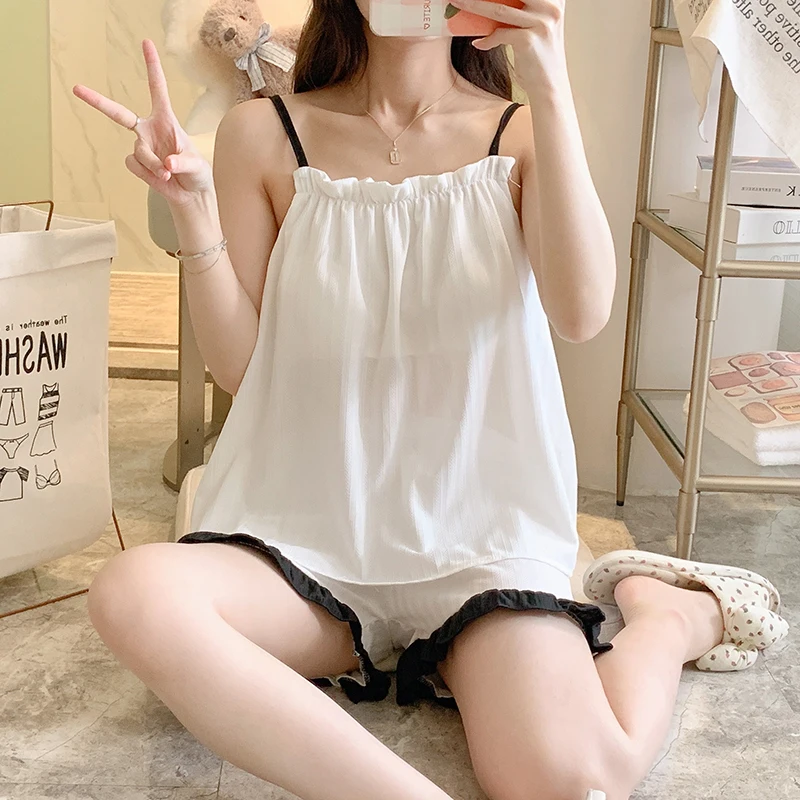 Summer new thin casual sweet solid color sexy suspender with chest pad 2 sets of young girls' home clothes free delivery
