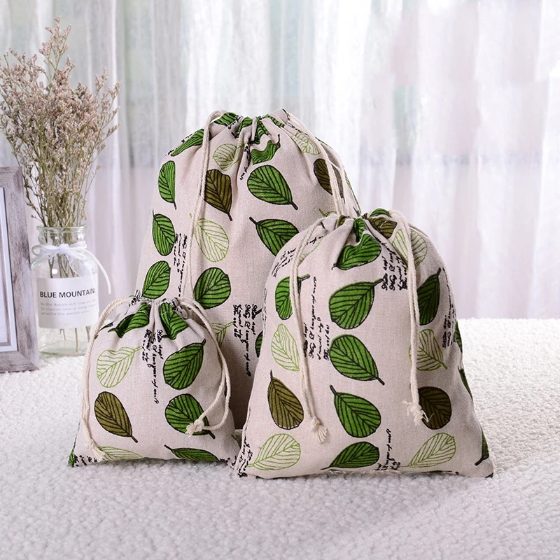 thumbnail image 1 of Bolsa de lino y algodón con cordón, con estampado de flores y plantas, para regalo de Navidad, para guardar llaves, monedas, dulces, organizador de cosméticos y joyas para viajes, 1 of 5