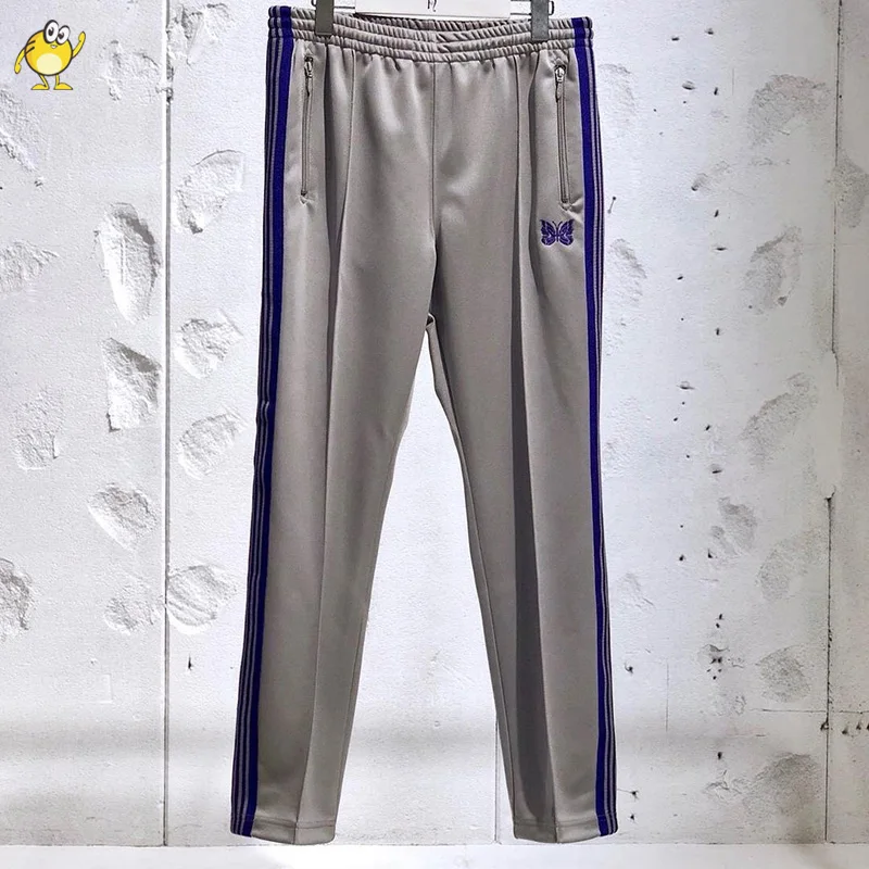 

Grey Needles Pants Purple Webbing Striped Butterfly Embroidery Sweatpants Men Woman 1:1 Best Quality Casual AWGE Trousers