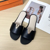 2024 summer new V-shaped metal decoration flat bottomed beach women's fashionable slippers - Image 2
