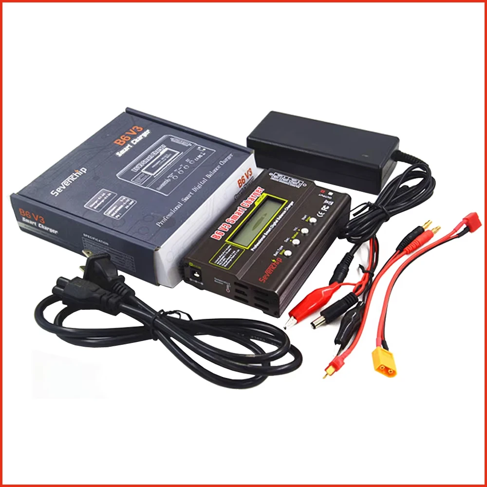 Chargeur multiport 90W rouge avec quatre adaptateurs secteur universels empilés