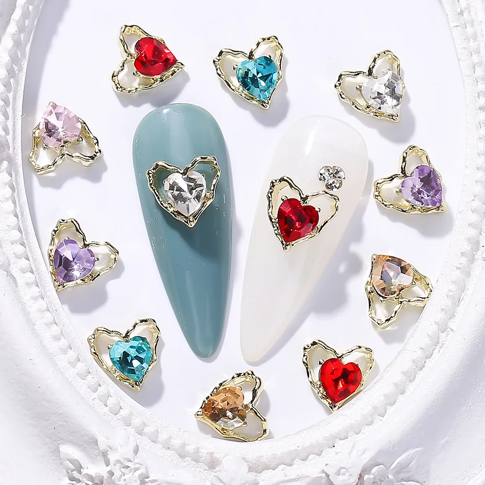 

10pcs 9x11MM Irregular Heart Nail Art Charm 3D Shiny Gem Crystal Hollow Heart Nail Decoration DIY Luxury Light Nail Accessories