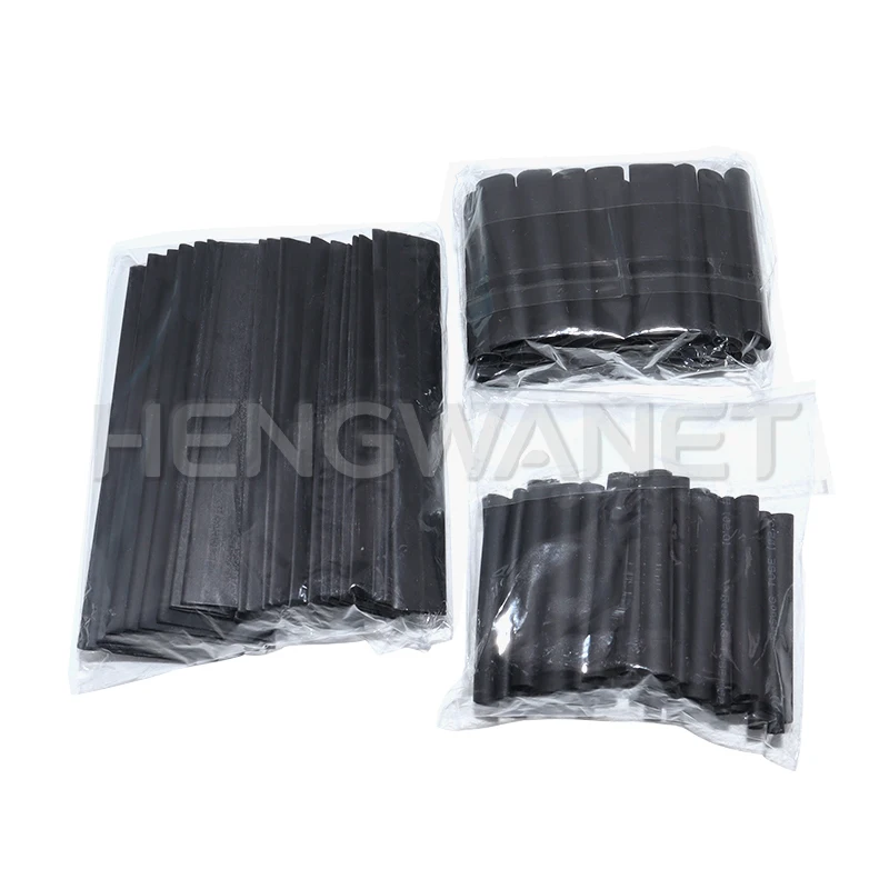Gaine thermorétractable noire appliquée sur une connexion de câble, isolant et protégeant la soudure.