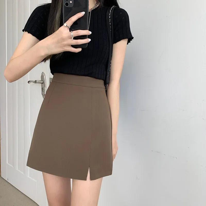 Minivestido de cintura alta con abertura lateral Niche Academy Summer Anti-exposición Falda de corte A para mujer Estilo coreano Embalaje debajo del trasero